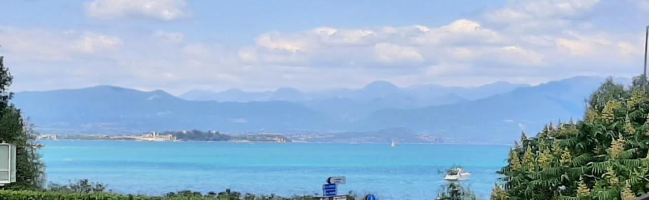 شقة Casa Maganda Vista Lago Tra Peschiera Del Garda E Sirmione المظهر الخارجي الصورة